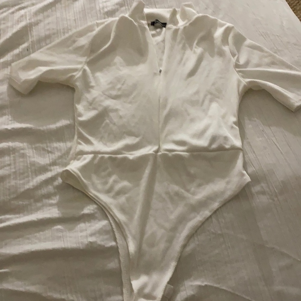 White bodysuit ( never worn)